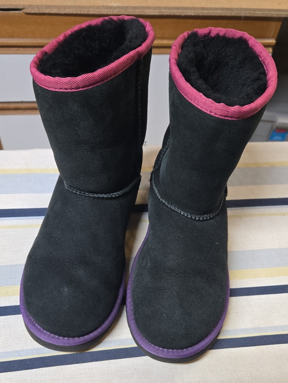 UGG Black Suede Mid-Calf Boots with Pink Trim and Purple Soles